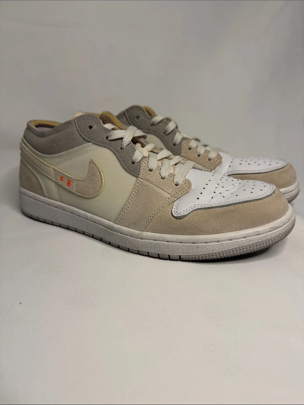 Nike woman’s Low-Top Sneakers — White & Beige with Orange Accent